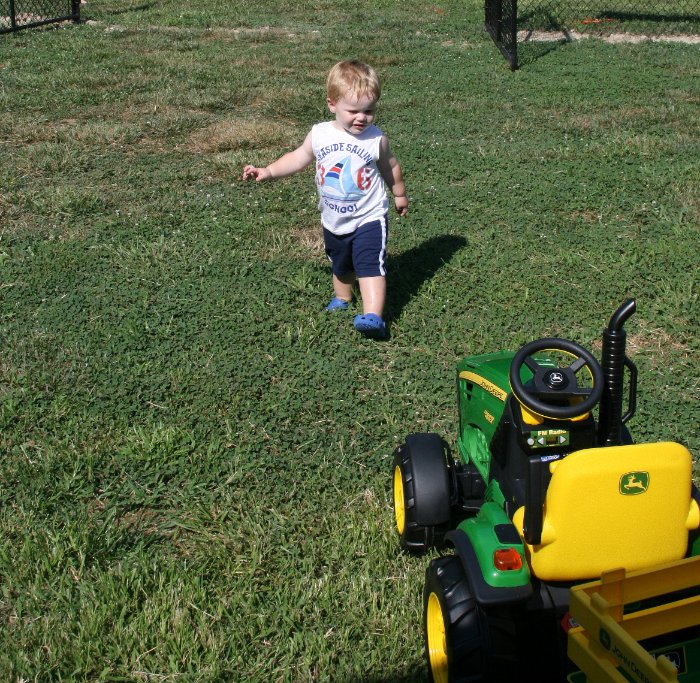 Jacob approaches his new John Deere Tractor